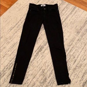 Black Paige jeans with gold zippers